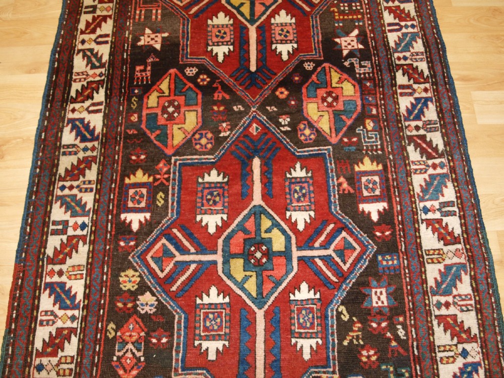 ANTIQUE CAUCASIAN KAZAK RUNNER, SUPERB DESIGN AND COLOUR, CIRCA 1900. View IV