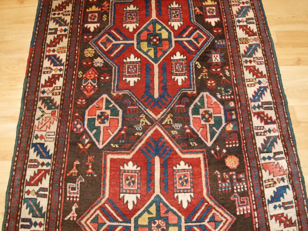 ANTIQUE CAUCASIAN KAZAK RUNNER, SUPERB DESIGN AND COLOUR, CIRCA 1900. View V