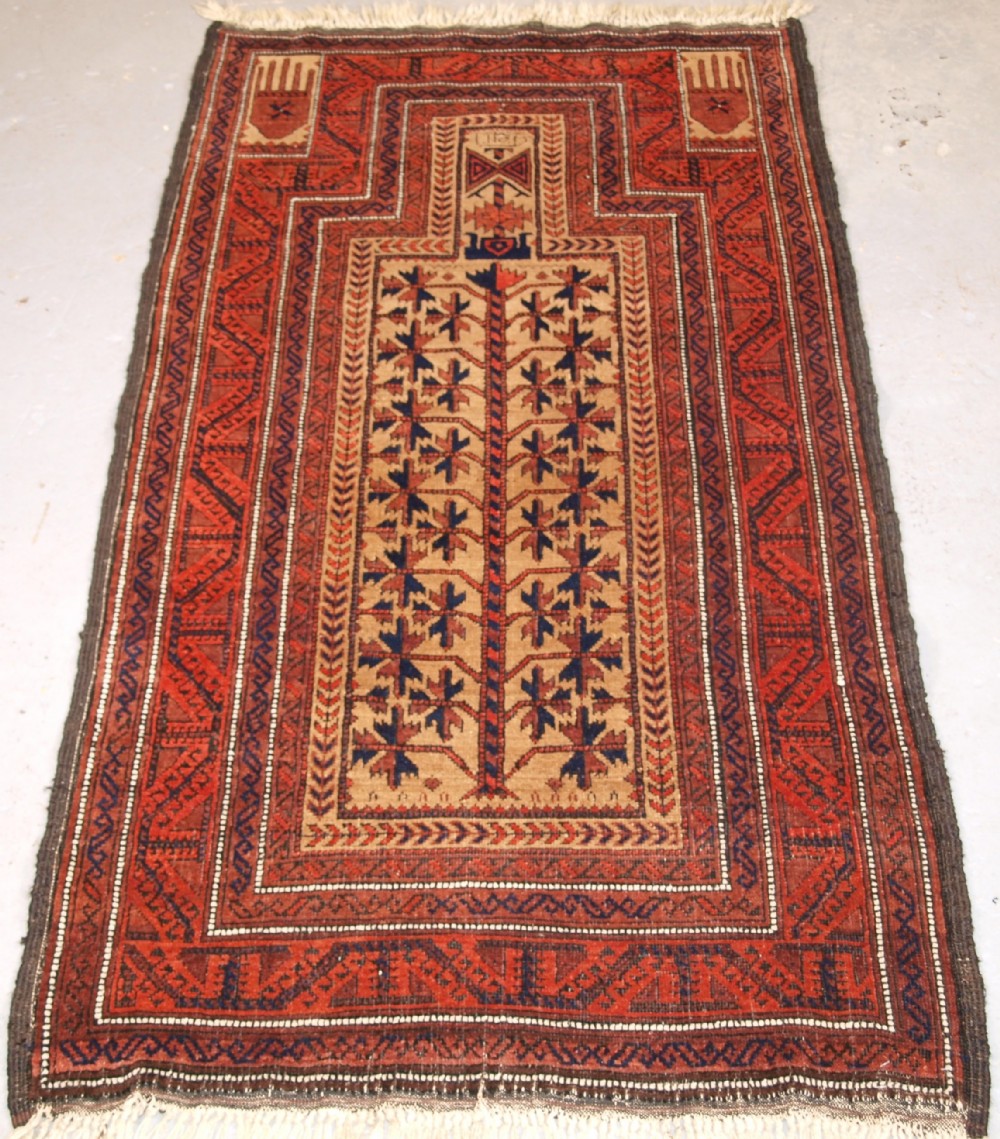 ANTIQUE BALUCH TREE OF LIFE PRAYER RUG, OUTSTANDING CONDITION, CIRCA 1900.