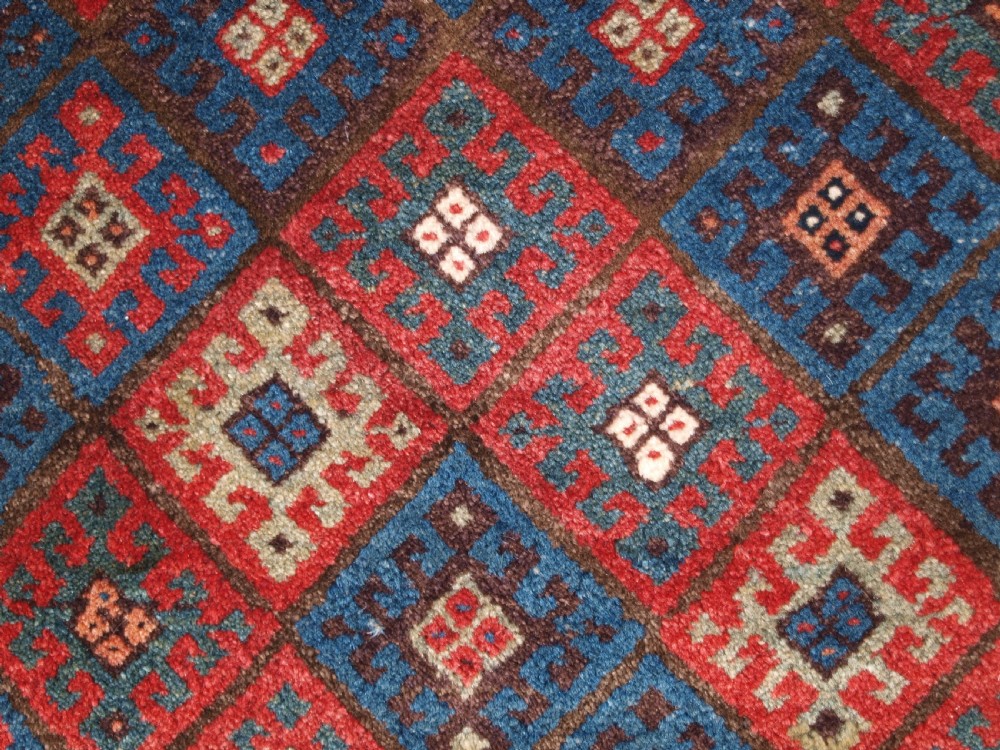 ANTIQUE JAF KURD BAG WITH PLAIN WEAVE ZIG ZAG BACK, CIRCA 1880. View IV