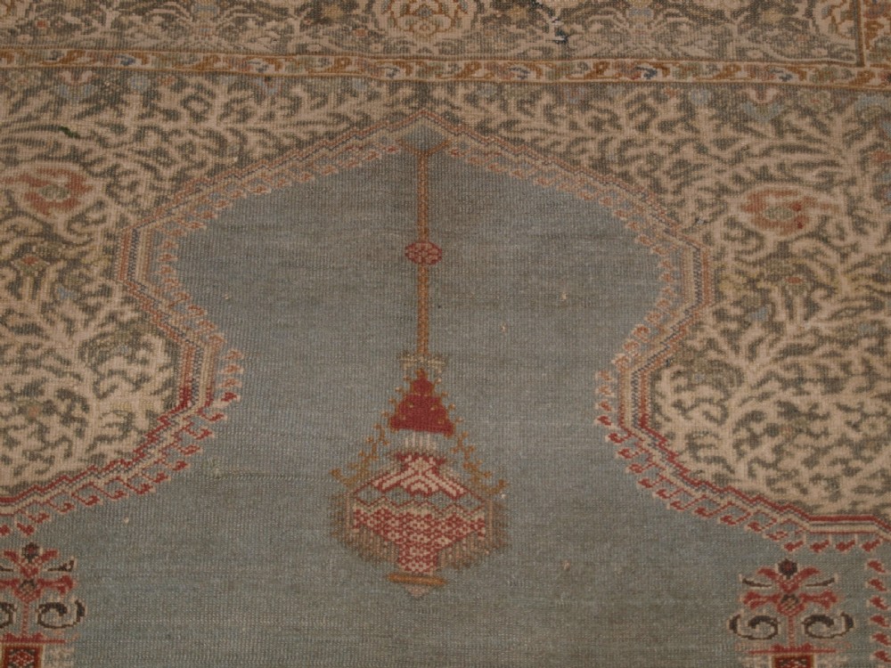 ANTIQUE TURKISH GHIORDES PRAYER RUG, LIGHT BLUE FIELD, CIRCA 1825-1850. View IV