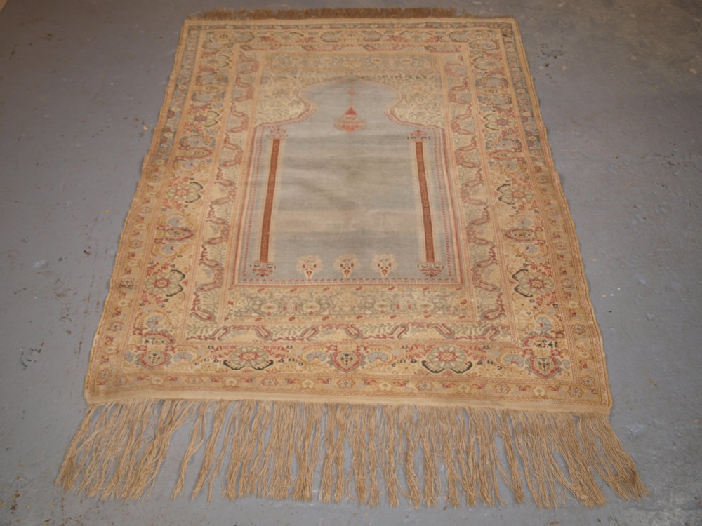 ANTIQUE TURKISH GHIORDES PRAYER RUG, LIGHT BLUE FIELD, CIRCA 1825-1850. View X