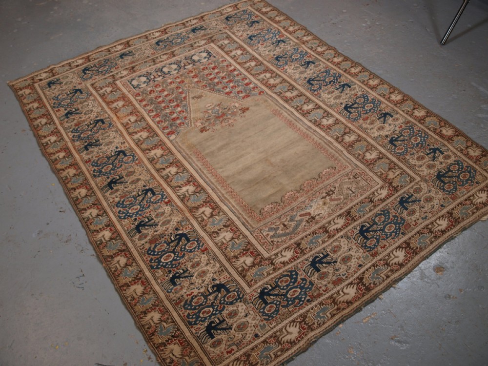 ANTIQUE TURKISH GHIORDES PRAYER RUG, GREEN GROUND, EARLY FORM, CIRCA 1750. View II