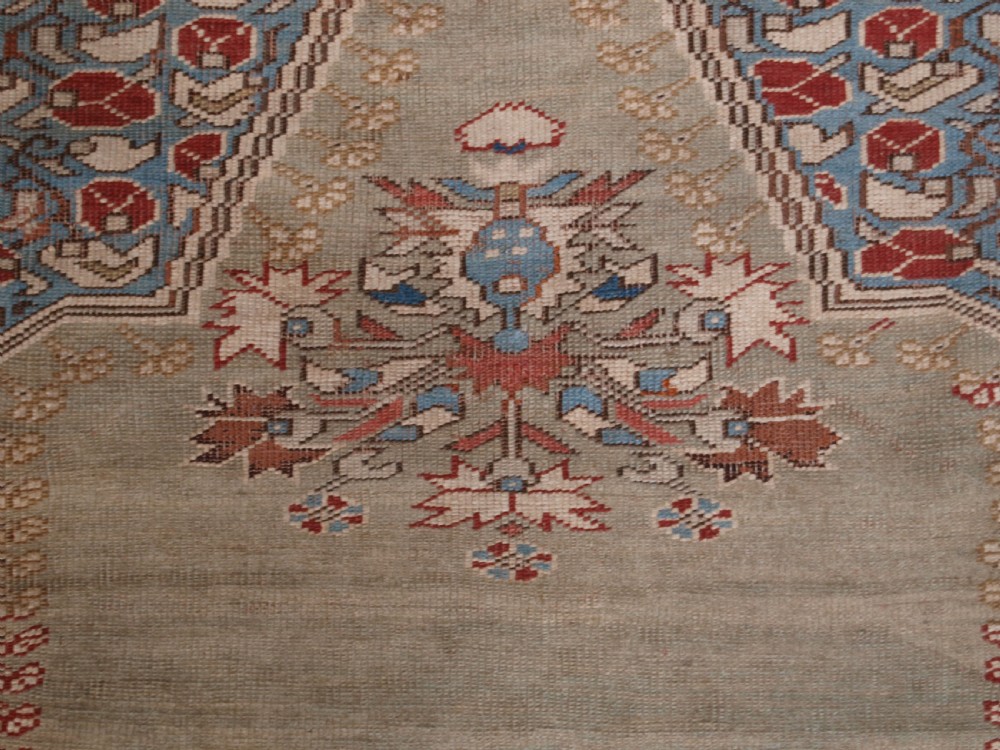 ANTIQUE TURKISH GHIORDES PRAYER RUG, GREEN GROUND, EARLY FORM, CIRCA 1750. View VII