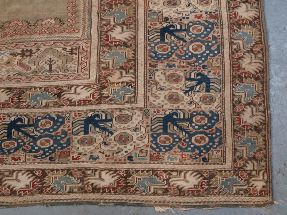 ANTIQUE TURKISH GHIORDES PRAYER RUG, GREEN GROUND, EARLY FORM, CIRCA 1750. View IX