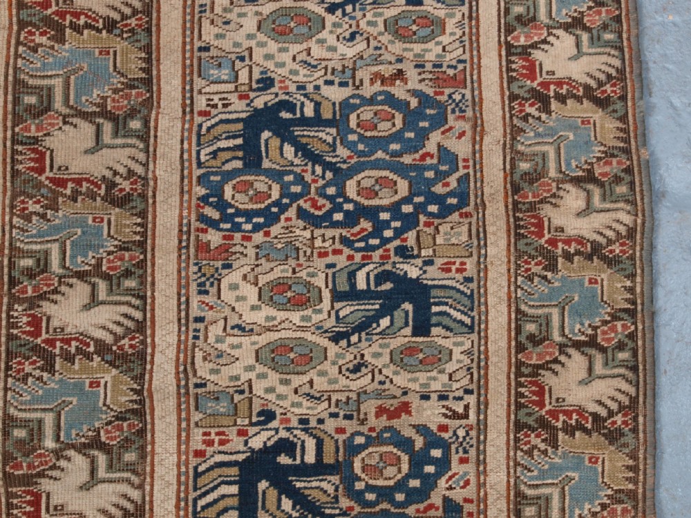 ANTIQUE TURKISH GHIORDES PRAYER RUG, GREEN GROUND, EARLY FORM, CIRCA 1750. View X