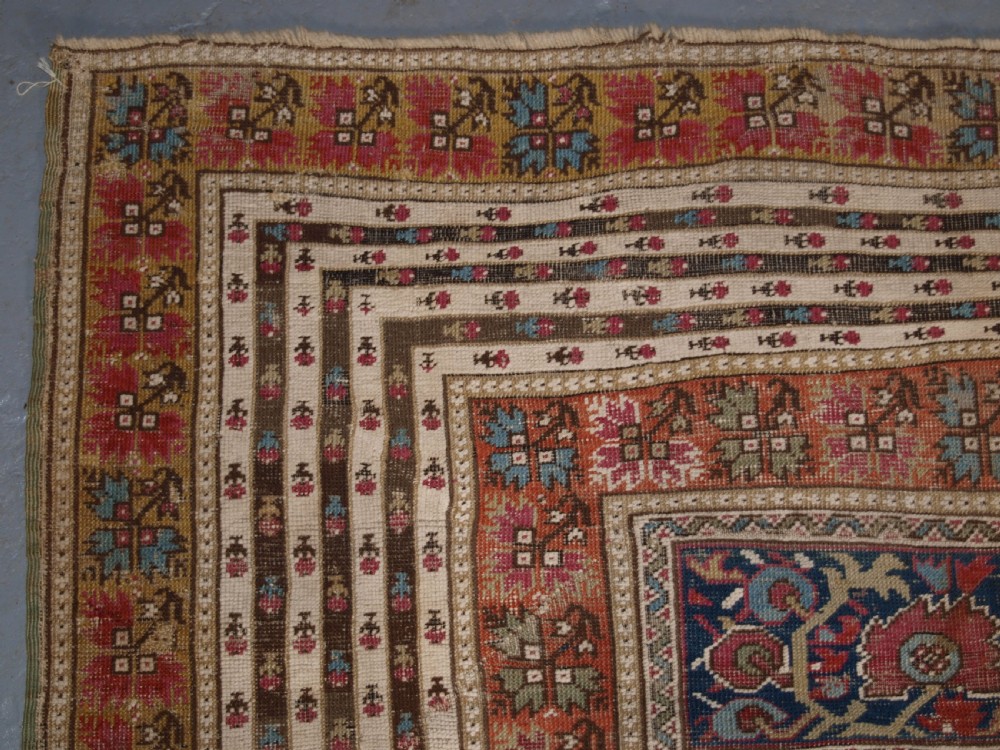 ANTIQUE TURKISH GHIORDES PRAYER RUG, MULTIPLE BORDERS, GREEN FIELD, CIRCA 1800. View V