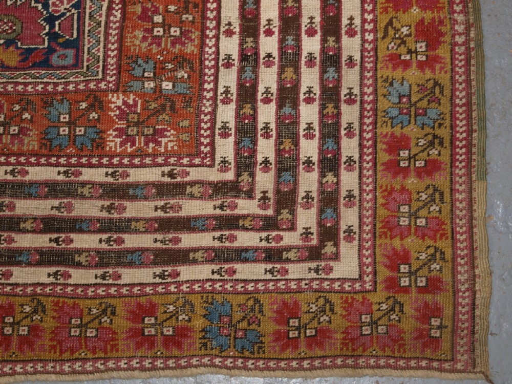 ANTIQUE TURKISH GHIORDES PRAYER RUG, MULTIPLE BORDERS, GREEN FIELD, CIRCA 1800. View XI