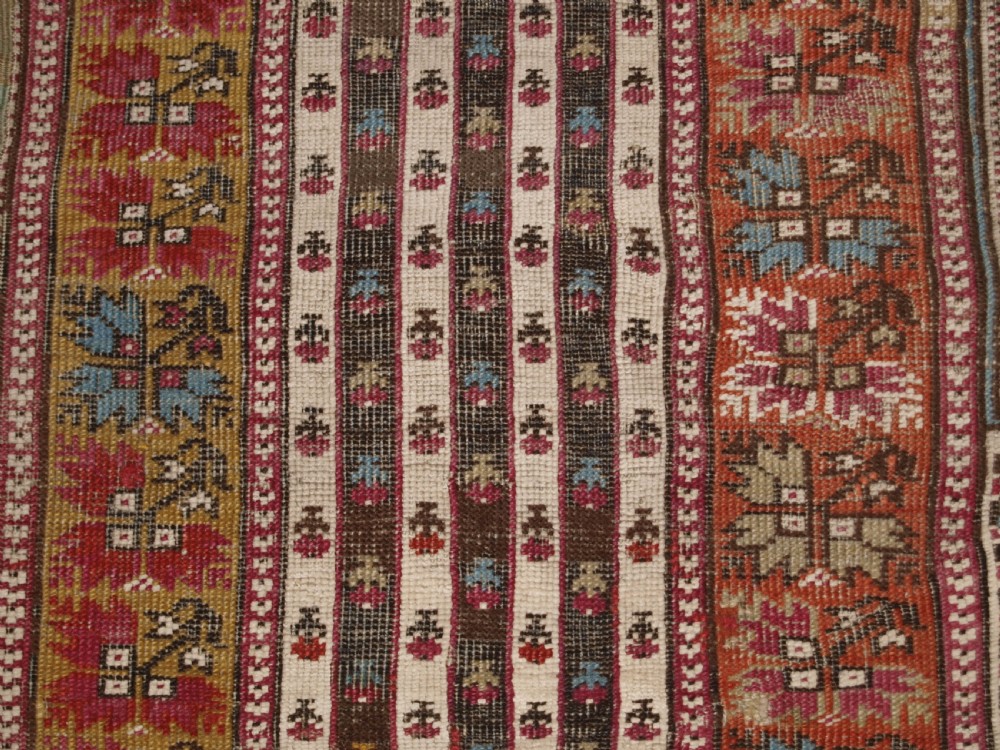 ANTIQUE TURKISH GHIORDES PRAYER RUG, MULTIPLE BORDERS, GREEN FIELD, CIRCA 1800. View XIII