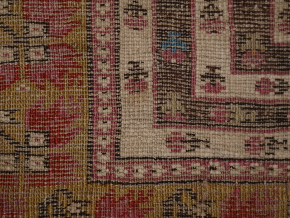 ANTIQUE TURKISH GHIORDES PRAYER RUG, MULTIPLE BORDERS, GREEN FIELD, CIRCA 1800. View XIV