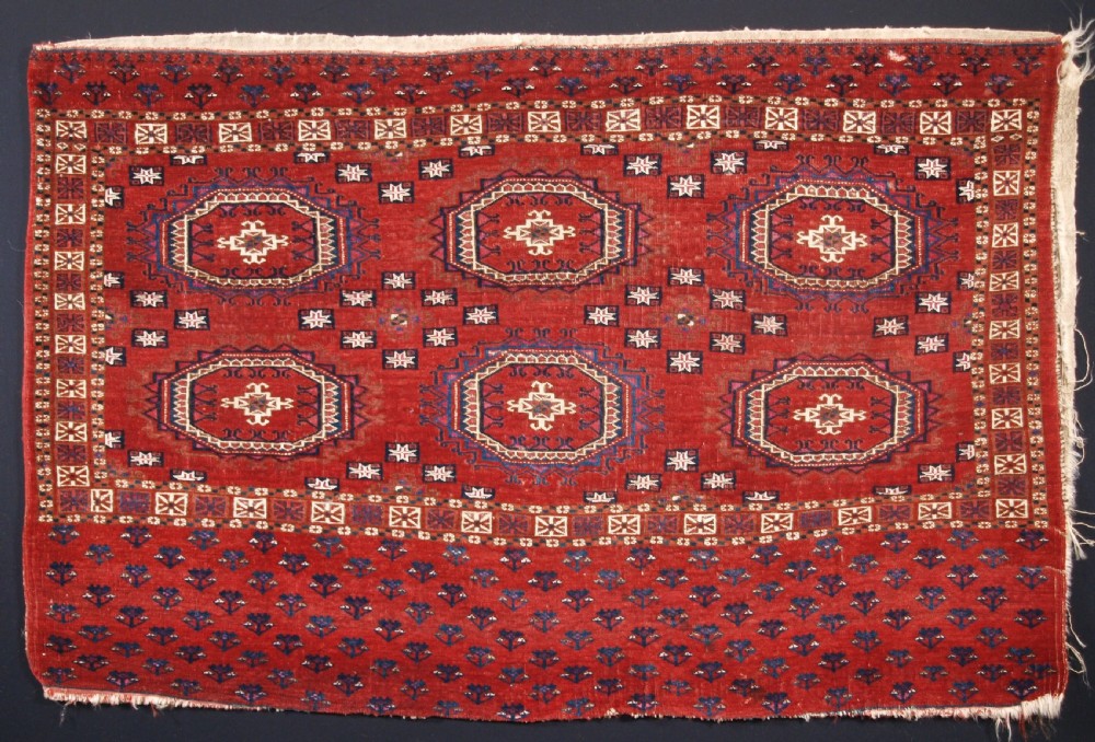 ANTIQUE TEKKE TURKMEN CHUVAL, SILK AND COTTON HIGHLIGHTS, SALOR GULS, CIRCA 1825.
