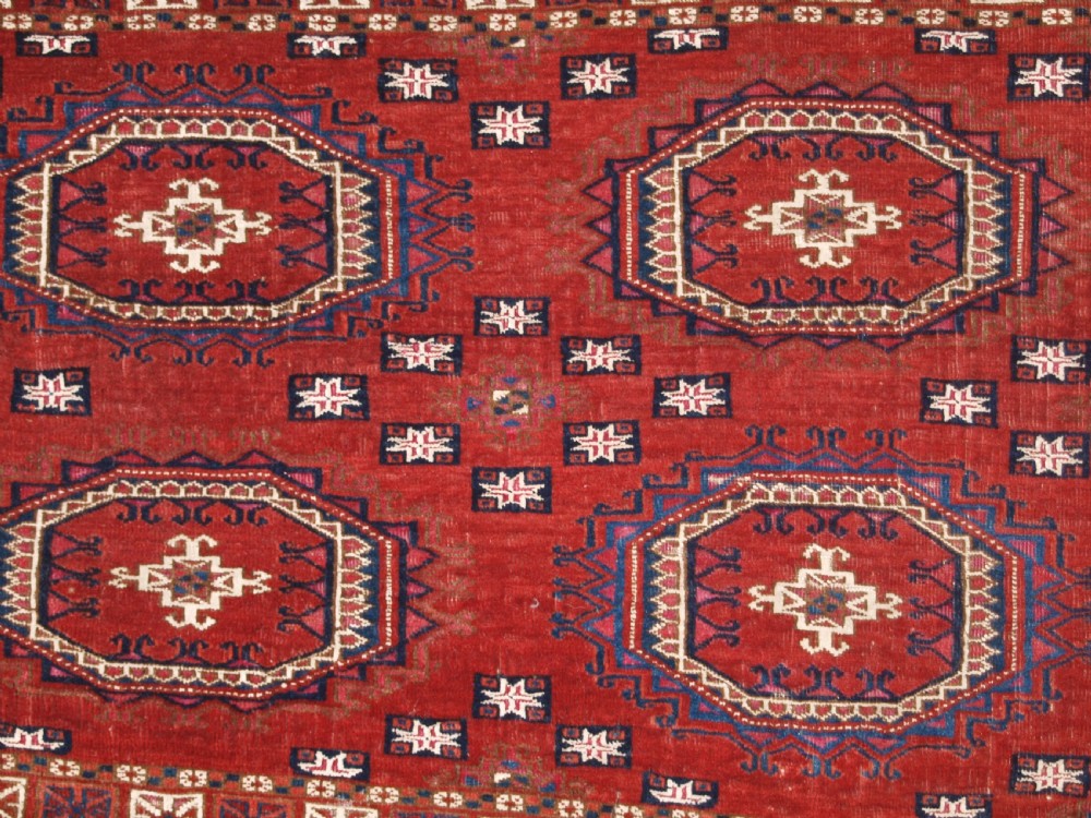 ANTIQUE TEKKE TURKMEN CHUVAL, SILK AND COTTON HIGHLIGHTS, SALOR GULS, CIRCA 1825. View VI