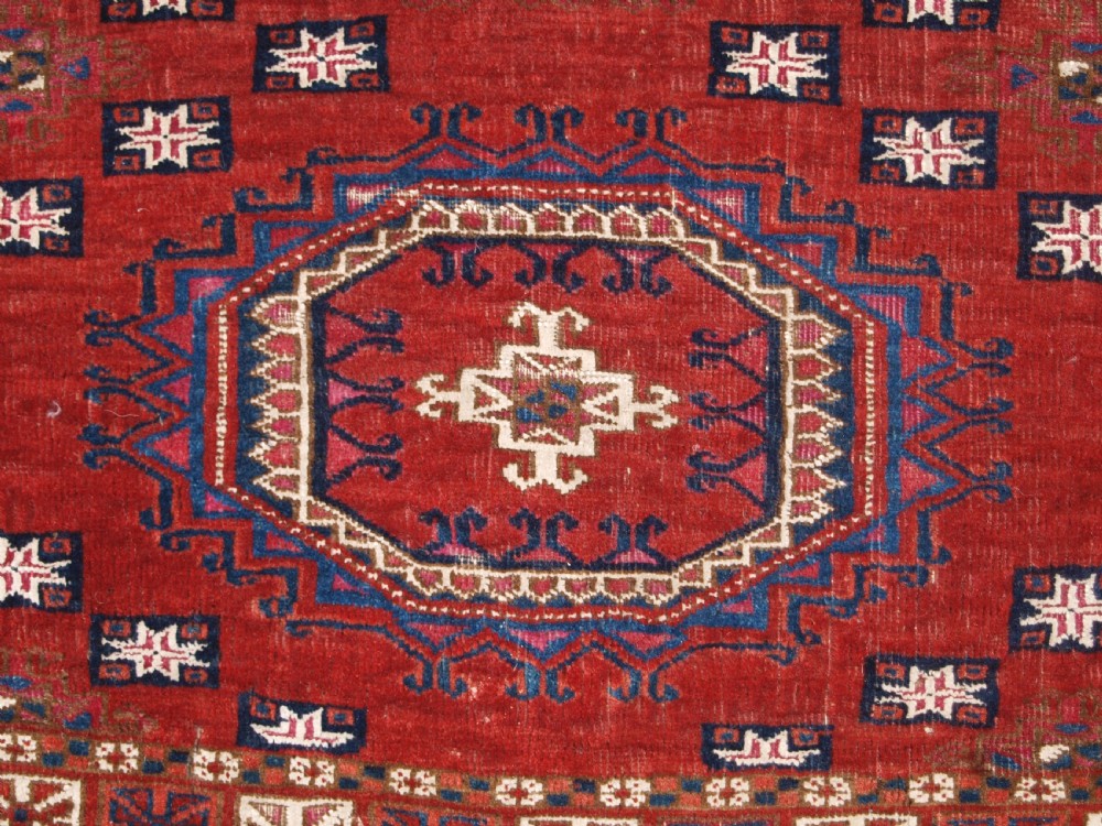 ANTIQUE TEKKE TURKMEN CHUVAL, SILK AND COTTON HIGHLIGHTS, SALOR GULS, CIRCA 1825. View IX