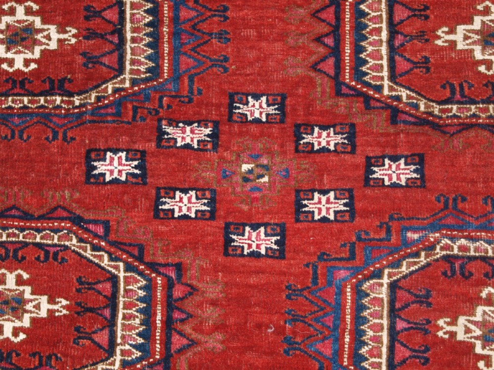 ANTIQUE TEKKE TURKMEN CHUVAL, SILK AND COTTON HIGHLIGHTS, SALOR GULS, CIRCA 1825. View X