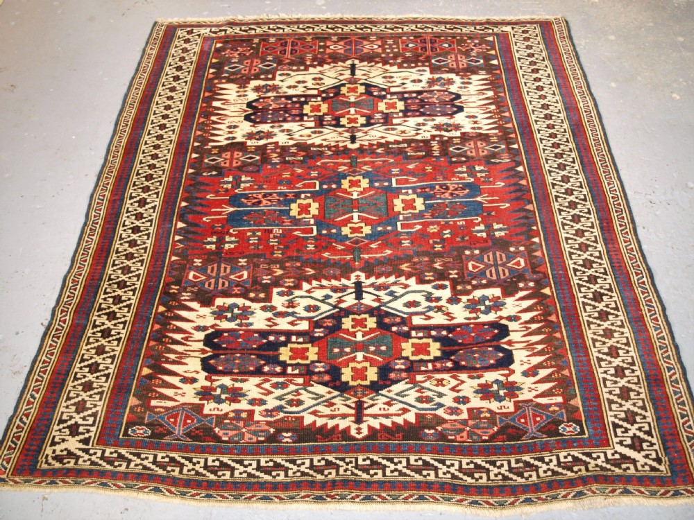 ANTIQUE CAUCASIAN ZEJWA VILLAGE RUG OF SCARCE DESIGN, CIRCA 1880.
