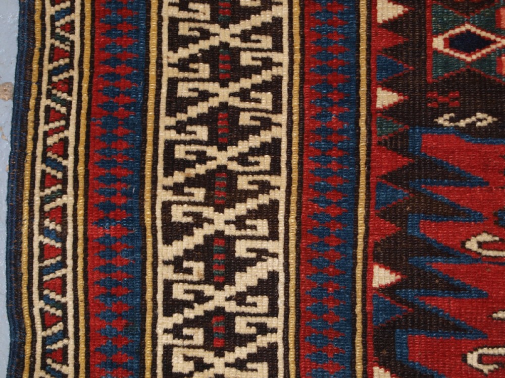 ANTIQUE CAUCASIAN ZEJWA VILLAGE RUG OF SCARCE DESIGN, CIRCA 1880. View VI