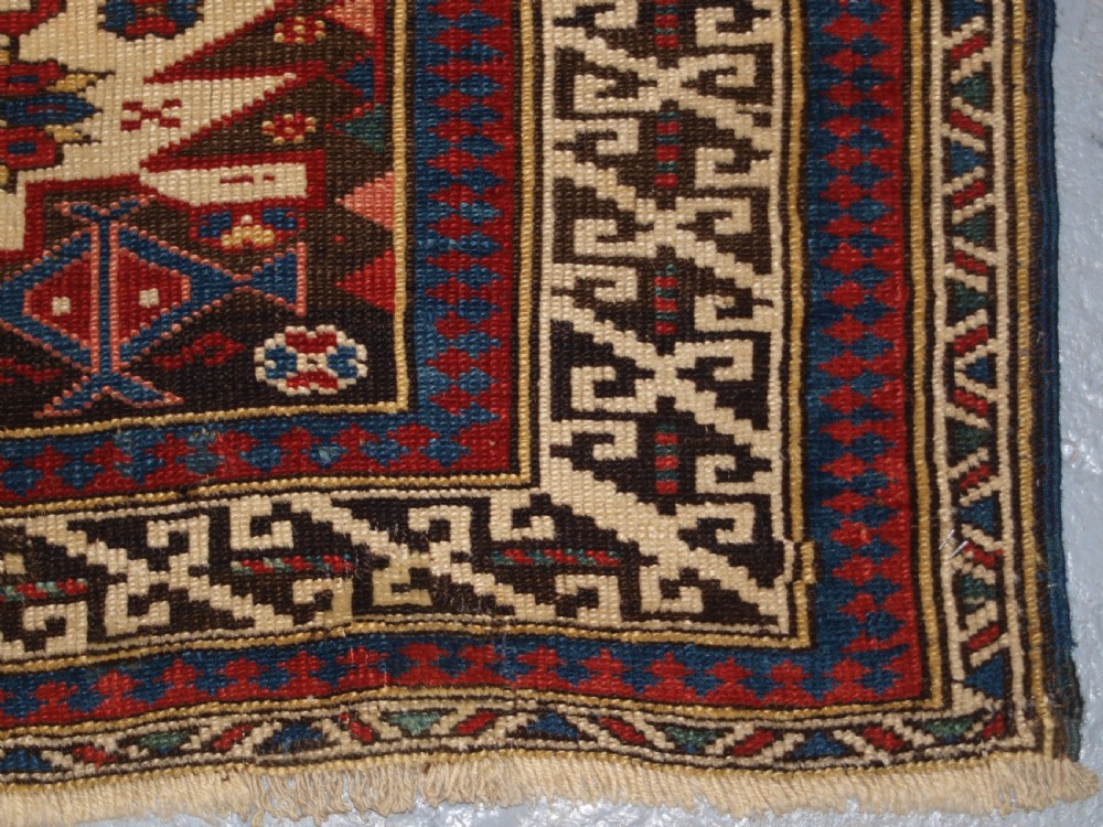 ANTIQUE CAUCASIAN ZEJWA VILLAGE RUG OF SCARCE DESIGN, CIRCA 1880. View X