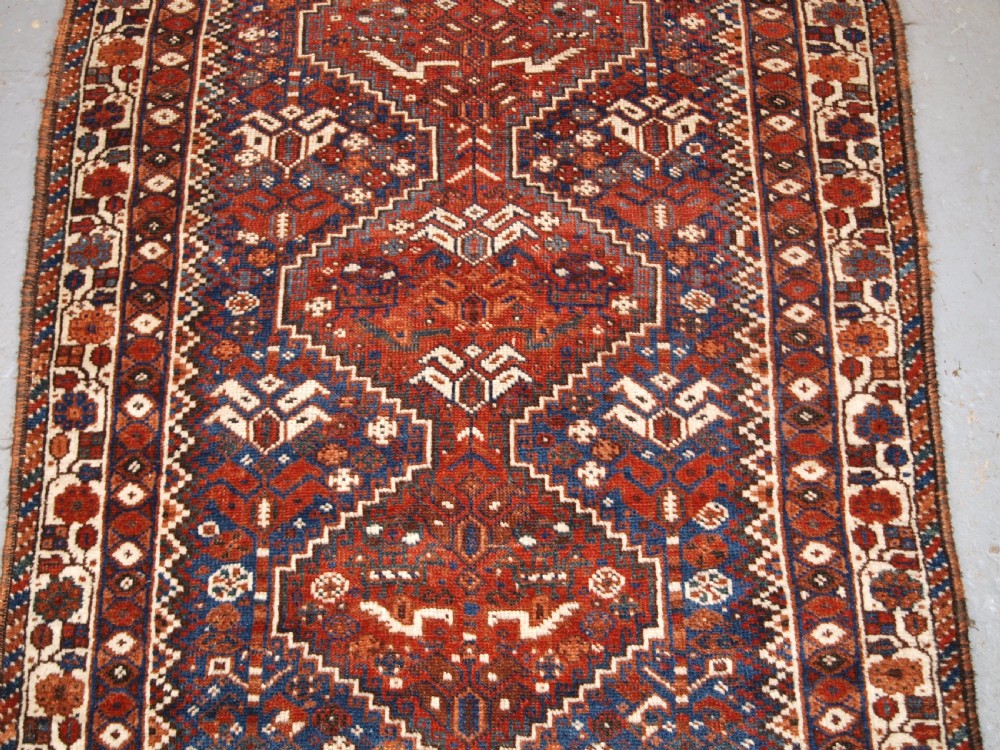 OLD KHAMSEH TRIBAL RUG, TRIBAL DESIGN, SMALL SIZE, CIRCA 1920. View III