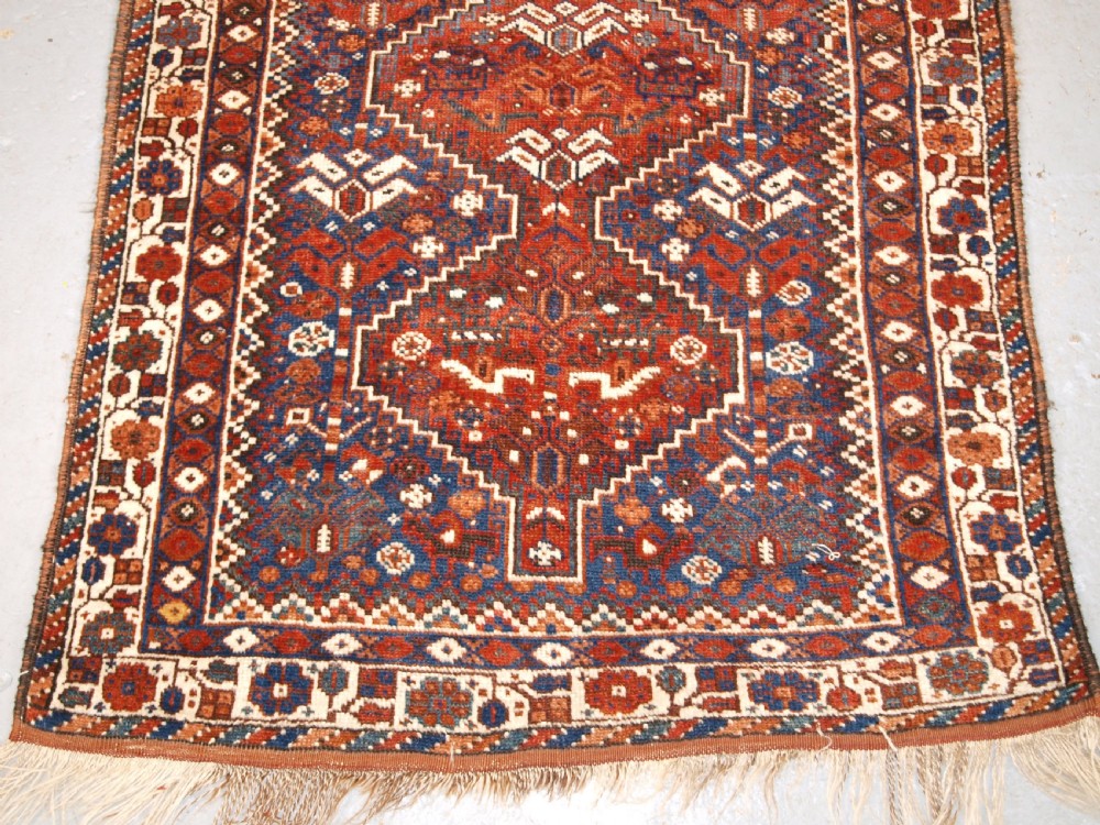 OLD KHAMSEH TRIBAL RUG, TRIBAL DESIGN, SMALL SIZE, CIRCA 1920. View IV