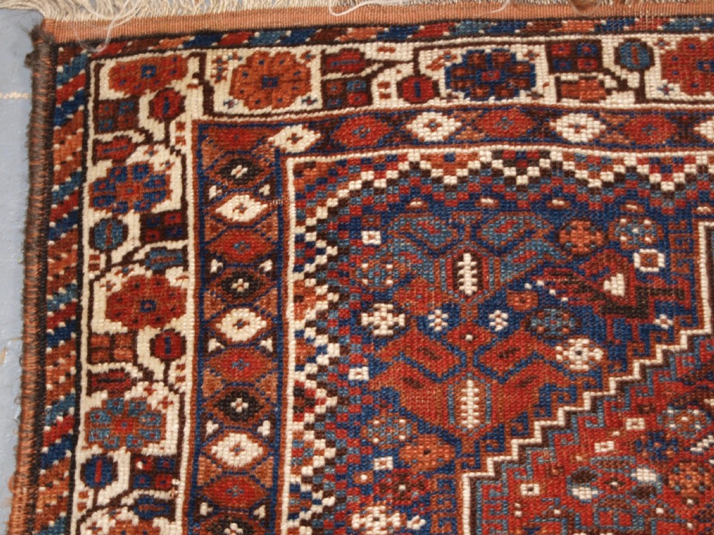 OLD KHAMSEH TRIBAL RUG, TRIBAL DESIGN, SMALL SIZE, CIRCA 1920. View V