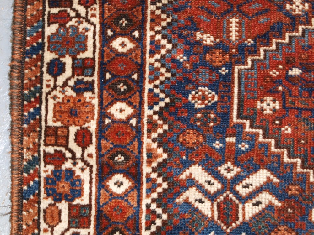 OLD KHAMSEH TRIBAL RUG, TRIBAL DESIGN, SMALL SIZE, CIRCA 1920. View VI