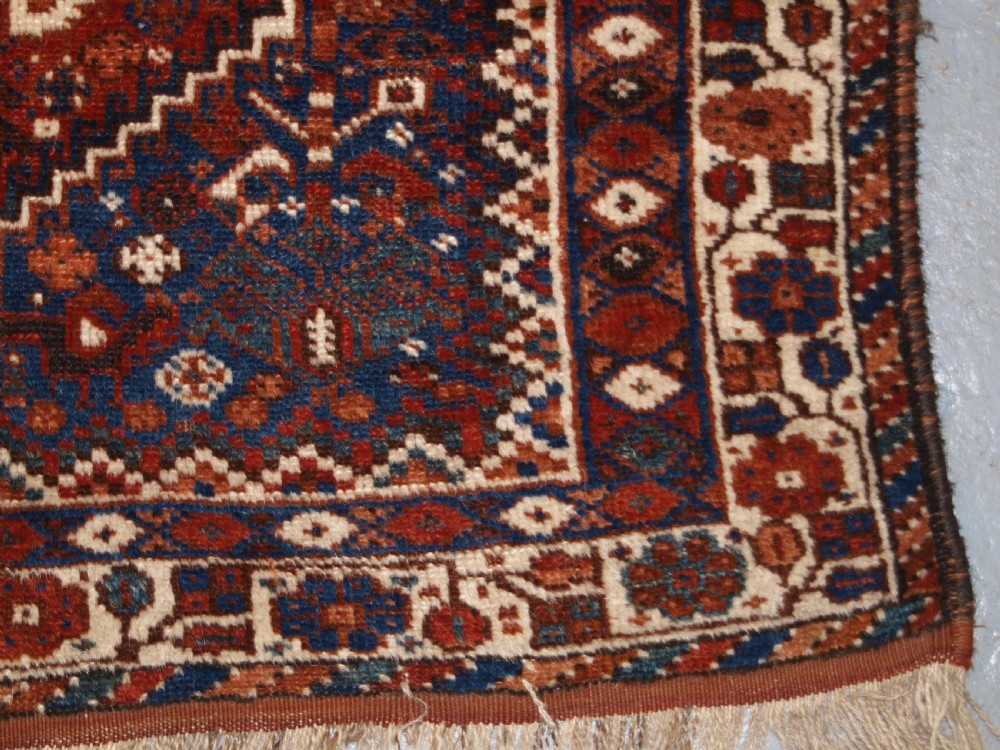 OLD KHAMSEH TRIBAL RUG, TRIBAL DESIGN, SMALL SIZE, CIRCA 1920. View X