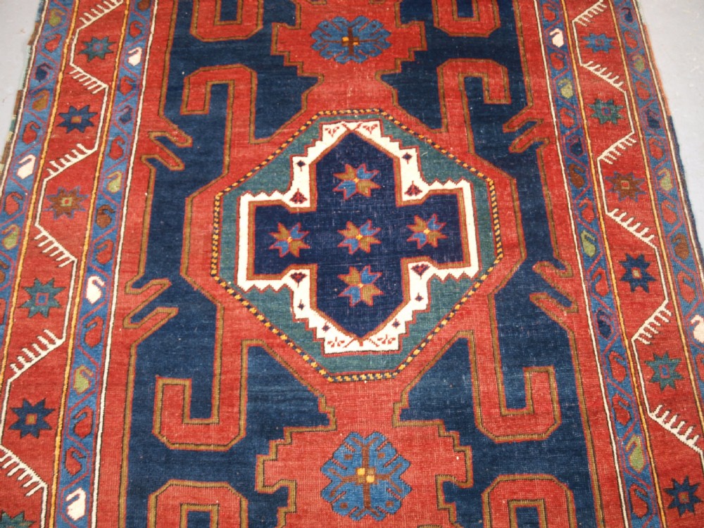 ANTIQUE CAUCASIAN KUBA REGION RUG WITH GYMYL DESIGN, CIRCA 1900. View III