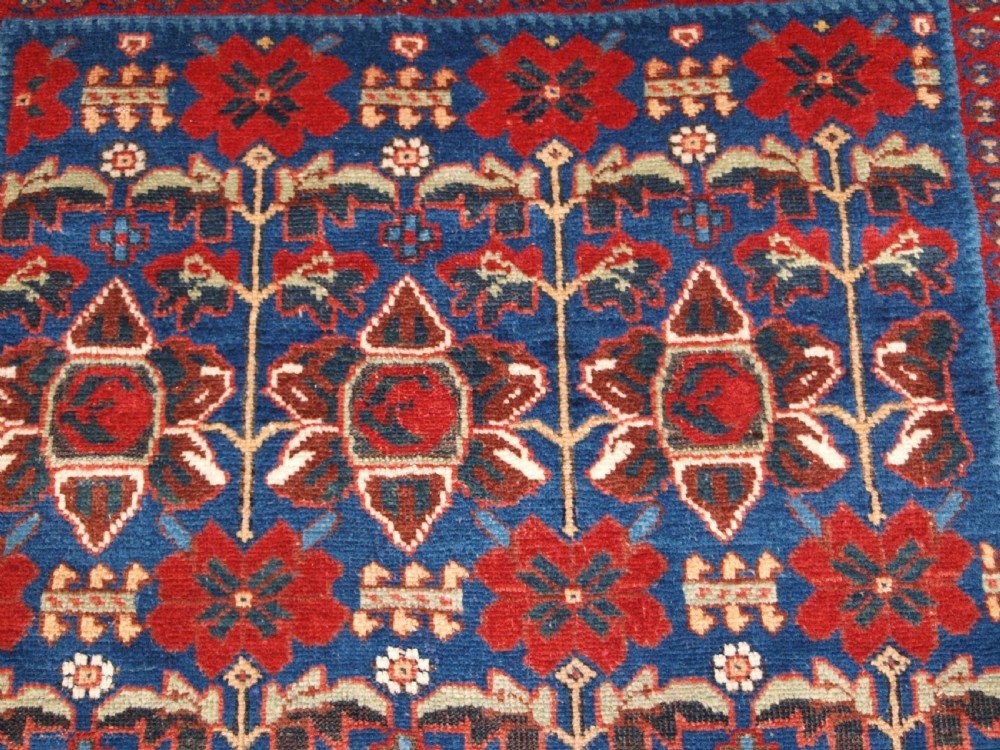 ANTIQUE AFSHAR RUG WITH UNUSUAL LARGE FLOWER DESIGN, CIRCA 1900. View VII