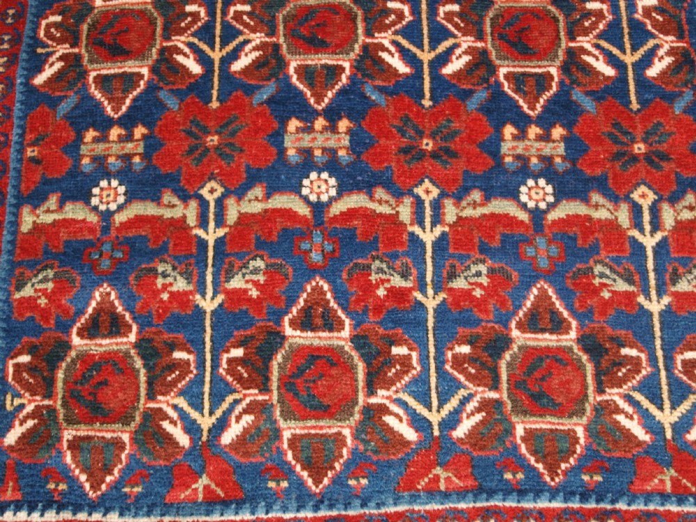 ANTIQUE AFSHAR RUG WITH UNUSUAL LARGE FLOWER DESIGN, CIRCA 1900. View IX