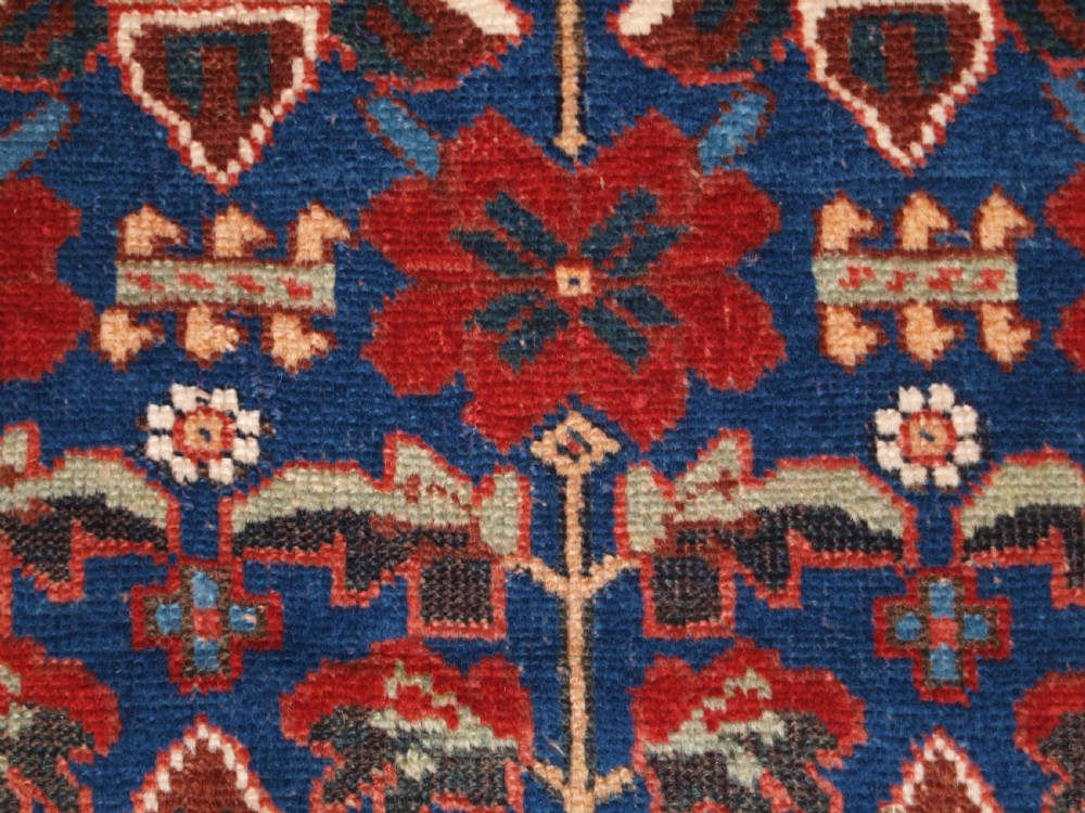 ANTIQUE AFSHAR RUG WITH UNUSUAL LARGE FLOWER DESIGN, CIRCA 1900. View X