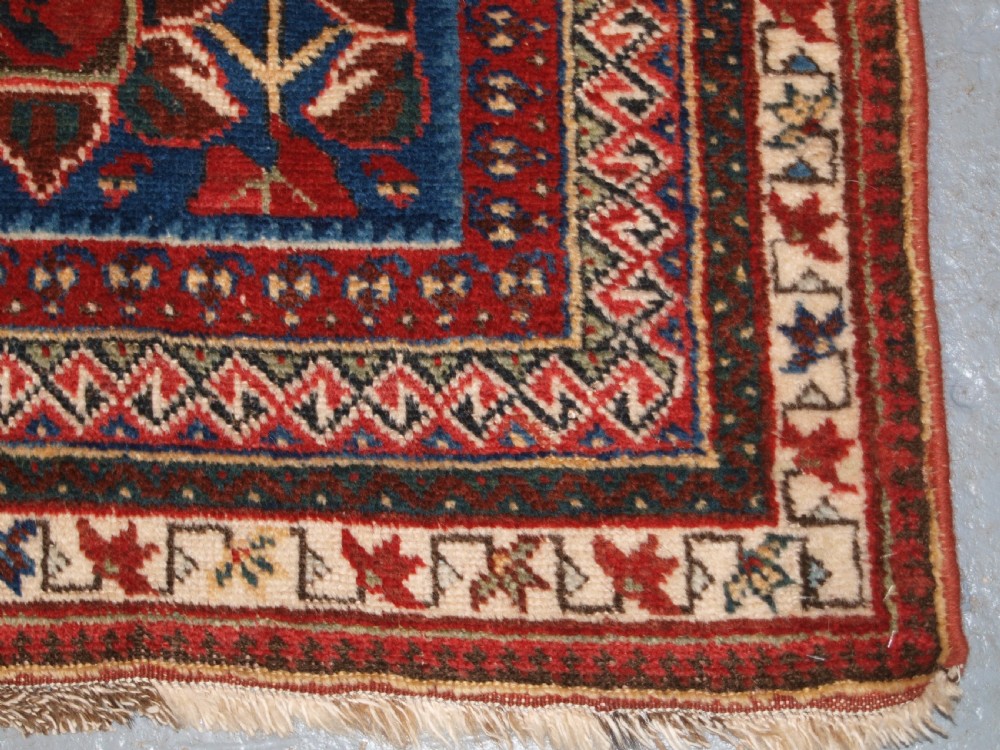 ANTIQUE AFSHAR RUG WITH UNUSUAL LARGE FLOWER DESIGN, CIRCA 1900. View XI