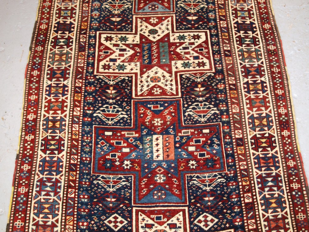 ANTIQUE CAUCASIAN SHIRVAN BAKU LONG RUG RUNNER, STAR DESIGN, CIRCA 1880. View IV