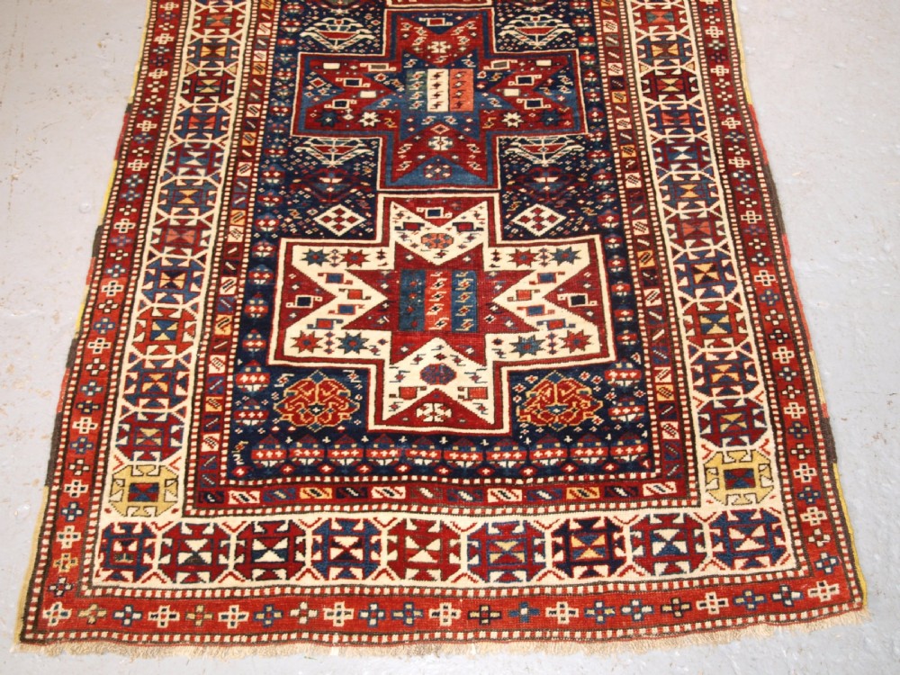 ANTIQUE CAUCASIAN SHIRVAN BAKU LONG RUG RUNNER, STAR DESIGN, CIRCA 1880. View V
