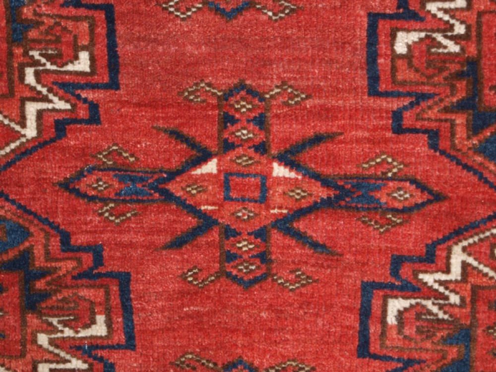 ANTIQUE KIZIL AYAK TURKMEN 9 GUL CHUVAL OF LARGE SIZE, CIRCA 1900. View X