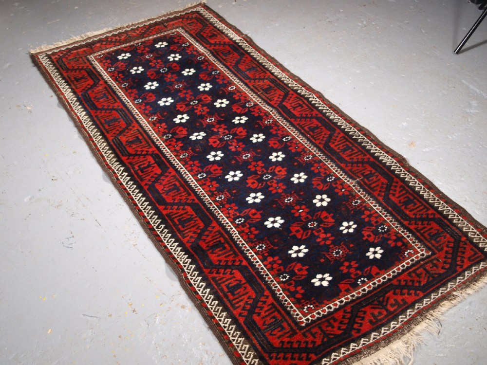 ANTIQUE BALUCH RUG WITH MINA KHANI DESIGN, EXCELLENT CONDITION, CIRCA 1900. View II