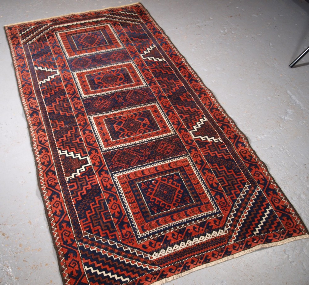 ANTIQUE BALUCH RUG WITH COMPARTMENT DESIGN, SOFT WOOL, CIRCA 1900. View II