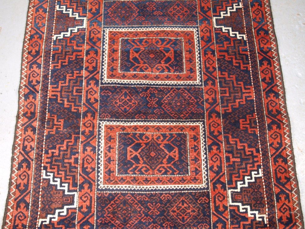 ANTIQUE BALUCH RUG WITH COMPARTMENT DESIGN, SOFT WOOL, CIRCA 1900. View IV