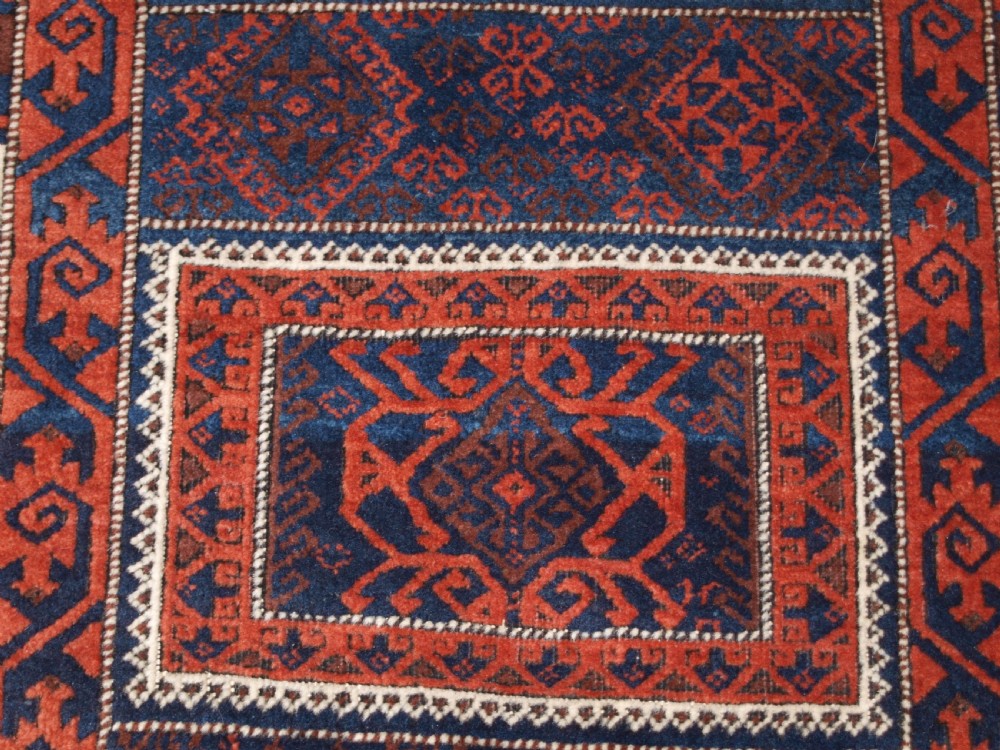 ANTIQUE BALUCH RUG WITH COMPARTMENT DESIGN, SOFT WOOL, CIRCA 1900. View VIII
