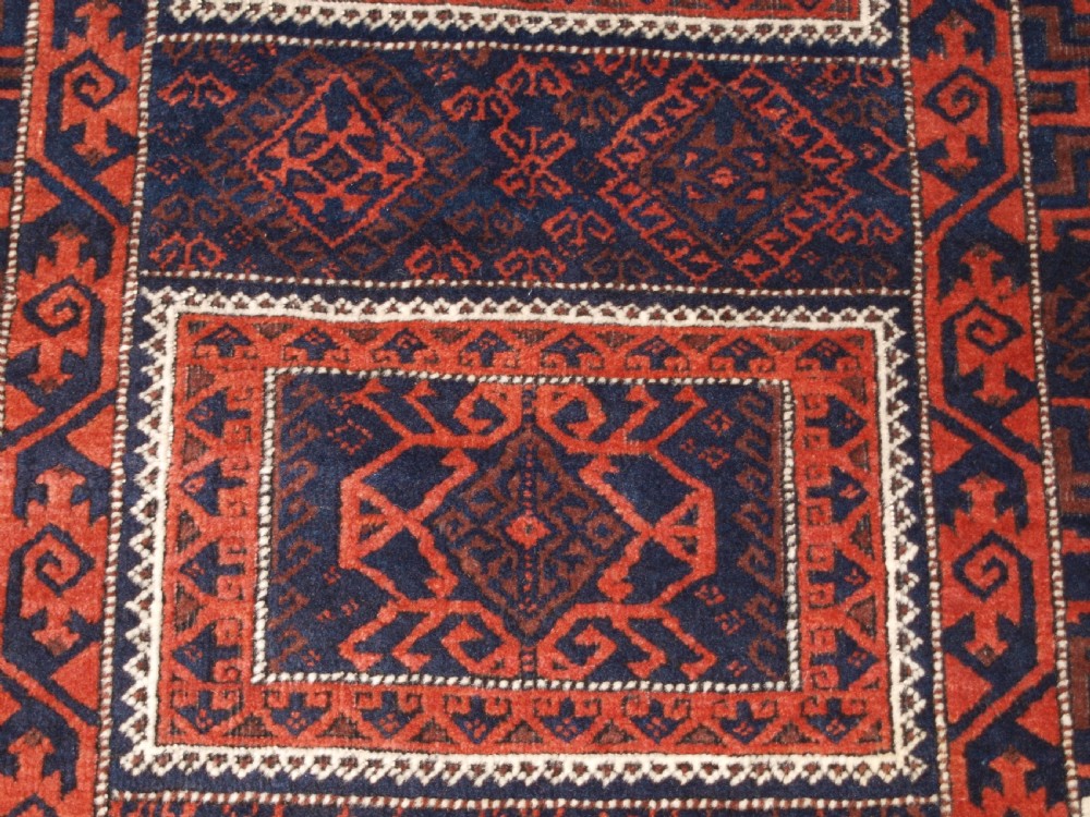 ANTIQUE BALUCH RUG WITH COMPARTMENT DESIGN, SOFT WOOL, CIRCA 1900. View X
