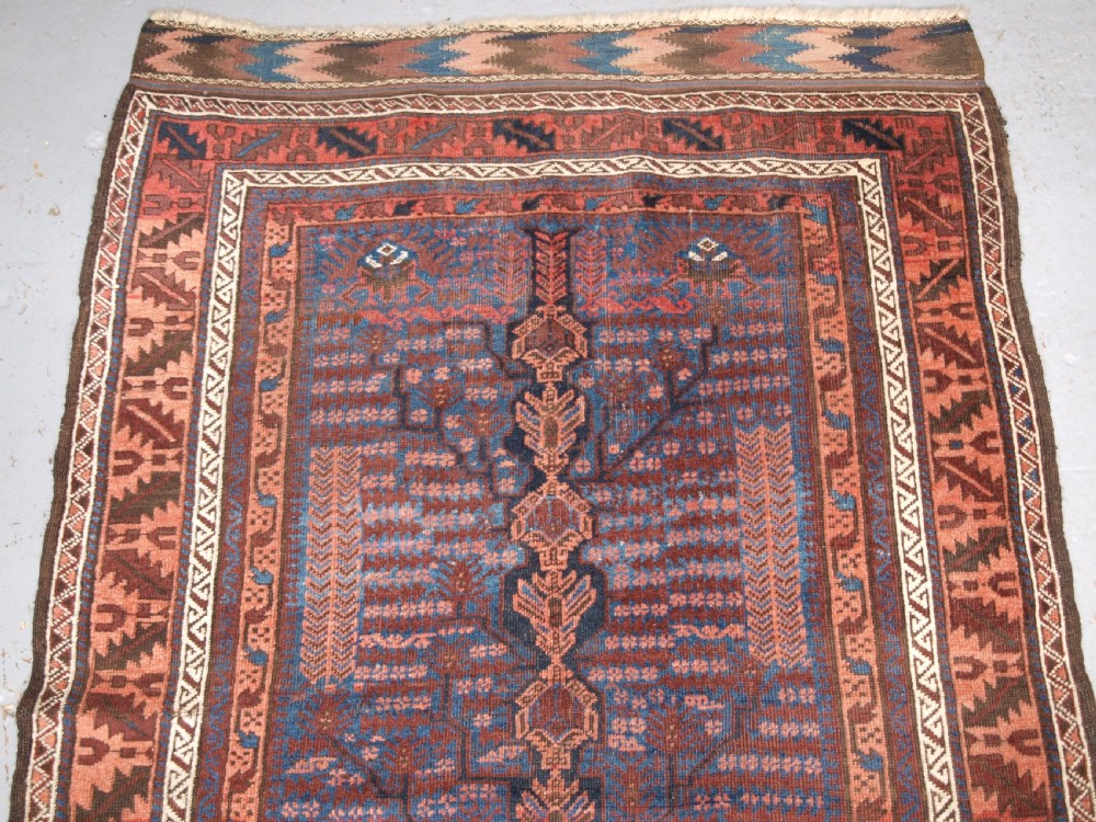 ANTIQUE TIMURI BALUCH RUG WITH BLUE GROUND AND TREE OF LIFE, CIRCA 1880. View III
