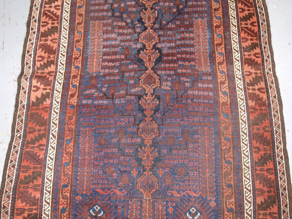 ANTIQUE TIMURI BALUCH RUG WITH BLUE GROUND AND TREE OF LIFE, CIRCA 1880. View IV
