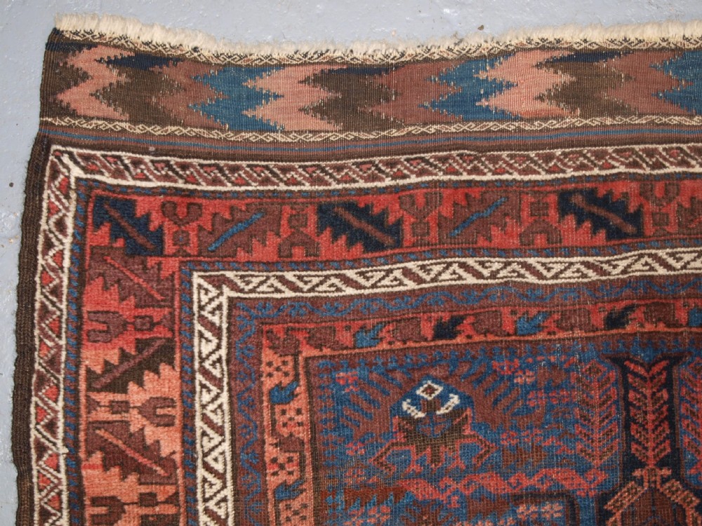 ANTIQUE TIMURI BALUCH RUG WITH BLUE GROUND AND TREE OF LIFE, CIRCA 1880. View VII