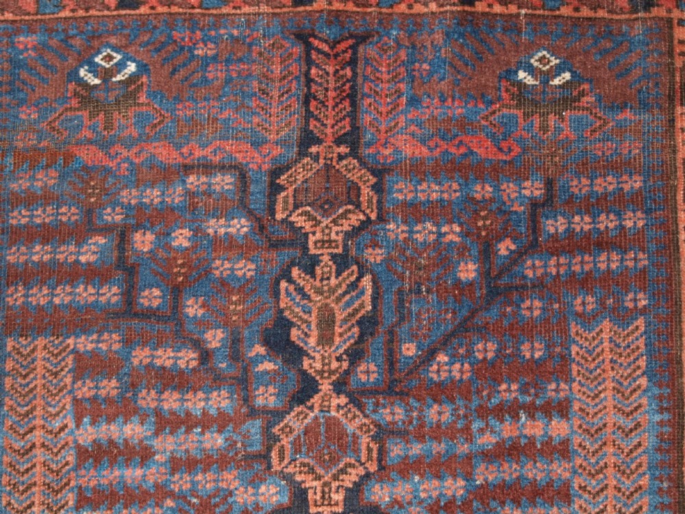 ANTIQUE TIMURI BALUCH RUG WITH BLUE GROUND AND TREE OF LIFE, CIRCA 1880. View XI