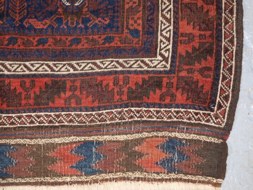 ANTIQUE TIMURI BALUCH RUG WITH BLUE GROUND AND TREE OF LIFE, CIRCA 1880. View XII