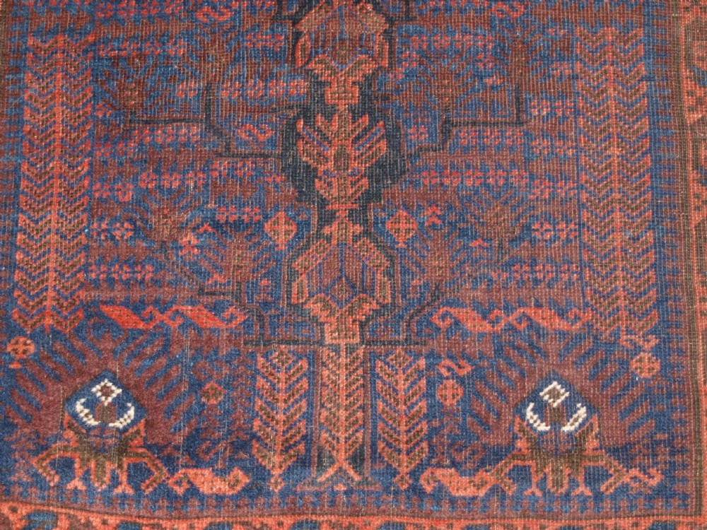 ANTIQUE TIMURI BALUCH RUG WITH BLUE GROUND AND TREE OF LIFE, CIRCA 1880. View XIII
