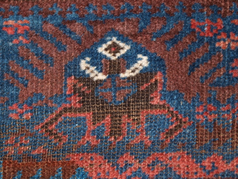 ANTIQUE TIMURI BALUCH RUG WITH BLUE GROUND AND TREE OF LIFE, CIRCA 1880. View XV