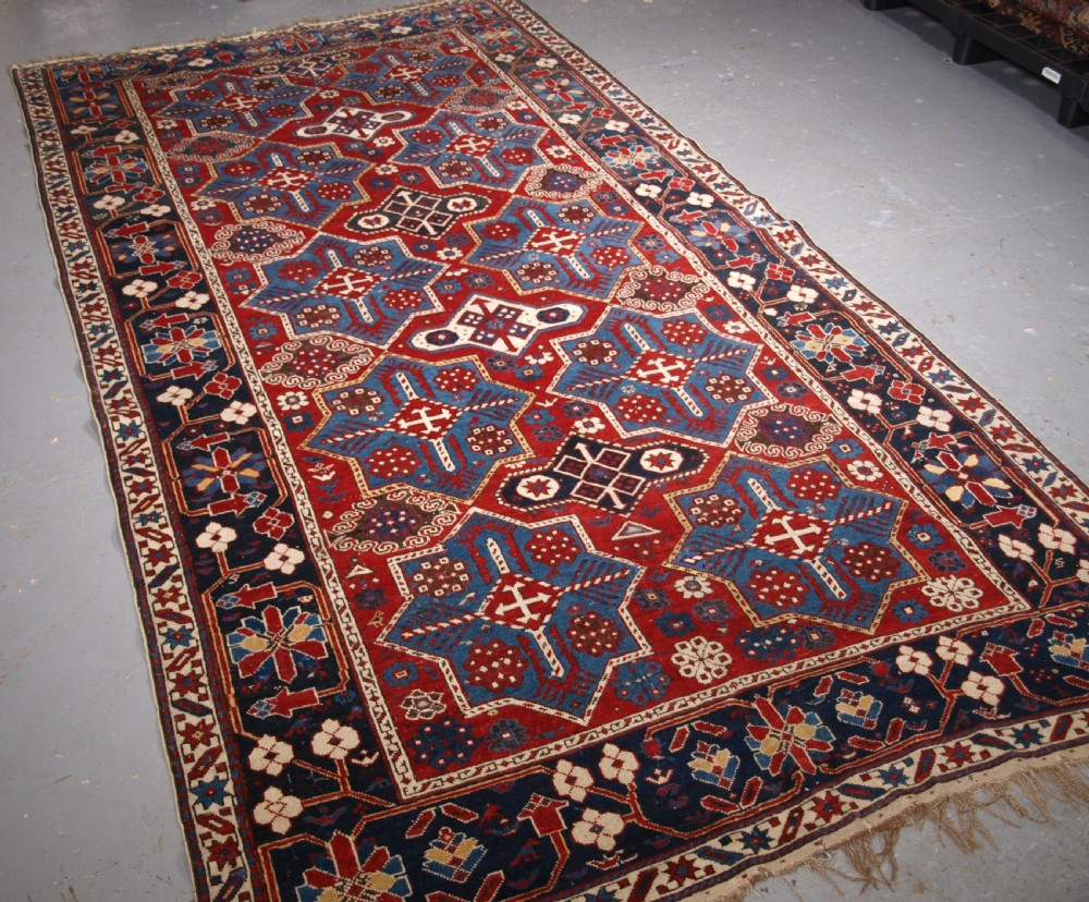 ANTIQUE CAUCASIAN SHIRVAN RUG WITH AKSTAFA STAR DESIGN, CIRCA 1890. View II