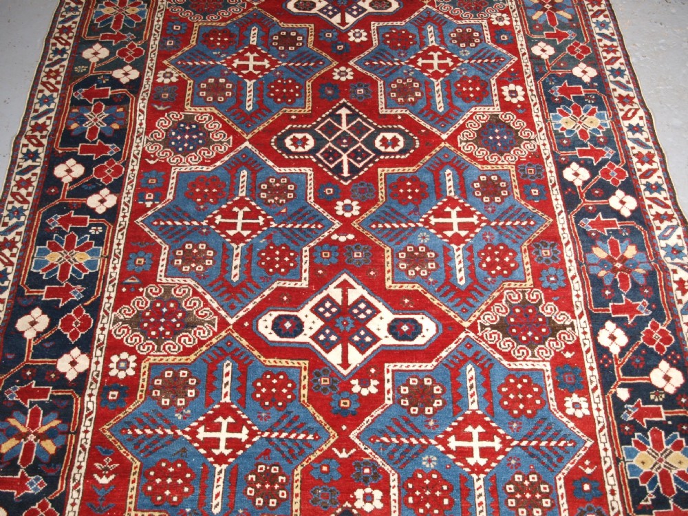 ANTIQUE CAUCASIAN SHIRVAN RUG WITH AKSTAFA STAR DESIGN, CIRCA 1890. View IV