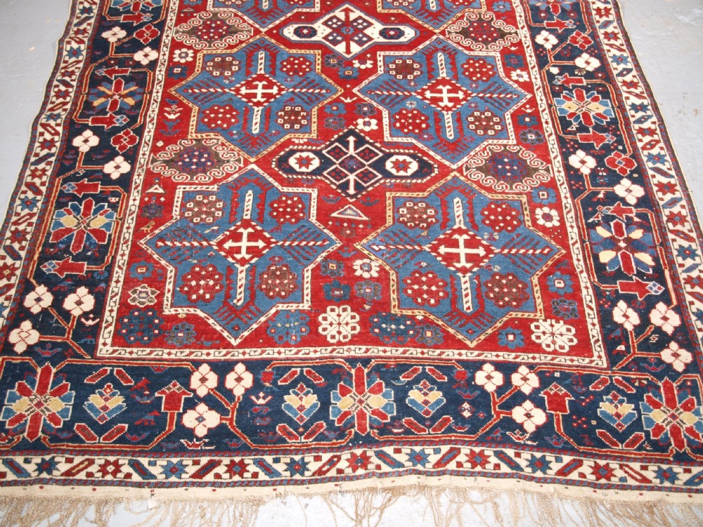 ANTIQUE CAUCASIAN SHIRVAN RUG WITH AKSTAFA STAR DESIGN, CIRCA 1890. View VI