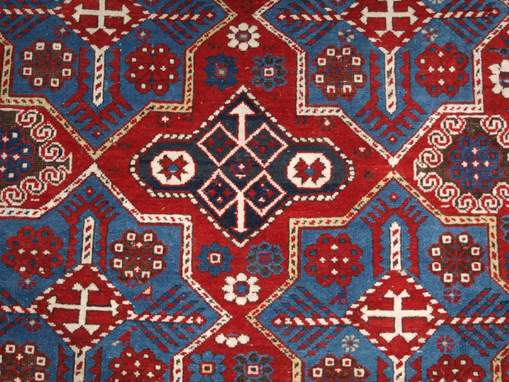 ANTIQUE CAUCASIAN SHIRVAN RUG WITH AKSTAFA STAR DESIGN, CIRCA 1890. View X